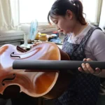 worke in Queshan Violin Industrial Park