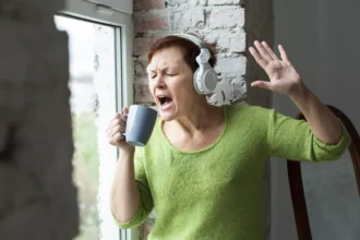senior-woman-singing-coffee-cup